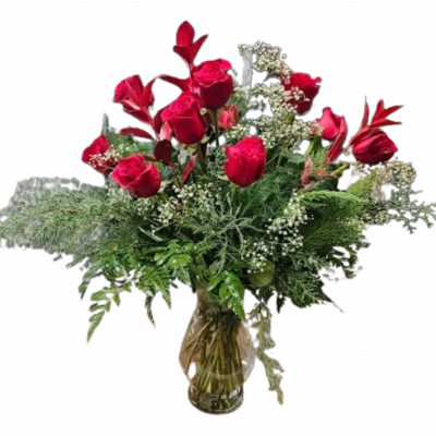 <table width="731">
<tbody>
<tr>
<td width="731">One dozen red roses accented with gypsophila, fresh assorted greens, and finished in a clear vase  - An absolute stunner!</td>
</tr>
</tbody>
</table>