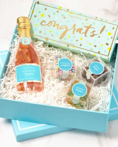 Say "Congrats" with extra sweetness when you send them a Sugarfina candy gift. The perfect way to send love for engagements, graduations, and more celebratory special moments. Gift Arrives in signature Blue box with a white ribbon.