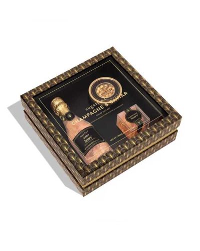 Cheers! 
Pop the champagne and open the caviar, it's time to celebrate! This unique gift set includes a limited-edition Bubbly Bears Celebration Bottle, Gold Chocolate Caviar Tin, and our best-selling Champagne Bears® made with Dom Pérignon Vintage Champagne. The perfect gift for getting into the festive spirit with all things bubbly and bright.