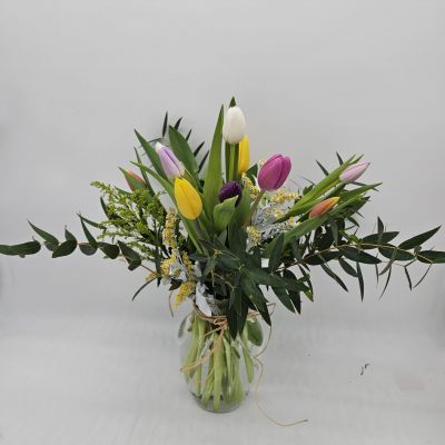 Send a beautiful mix of tulips, standard is 10 tulips, deluxe is 20 and premium is 30, arrive in a glass vase with fill and greens