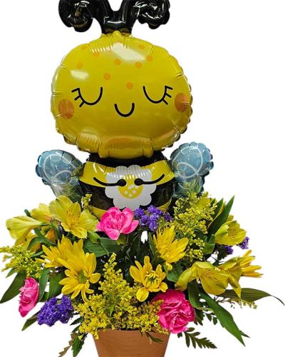 A sweet Bouquet that will surely bring a smile to your face. Bumble is a air filled balloon that will stay around for many days... the floral bouquet is a bright mix of daisies alstros mini carns with fillers of solidago and statice. Deluxe and Premium bouquets will be larger and more type of floral mix to value.

Shown is Deluxe size, only Premium has the ceramic vase that says bee well