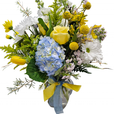 This gorgeous creation with hues of the Amalfi coast, shades of blues and yellows.
Florals can include, hydrangea,tulips, roses, daisies, stock, solidago, wax and assorted greens. Premium arrives blue glass keepsake vase. shown is deluxe
This item is arranged professionally by our floral team and an original design of Bloomingdays.