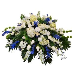 Blue and White Casket Cover Flower Arrangement
