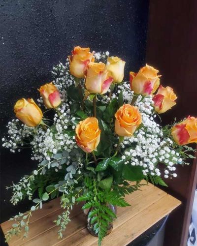 <p>Your Love & Devotion delivered. Surprise your special one with this gorgeous arrangement of orange roses.</p>
<p>It’s a an unforgettable display of your timeless love that they'll always remember.</p>
