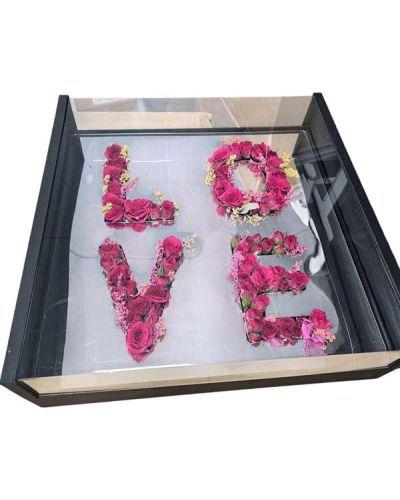<p>For those looking for the ultimate expression of love, look no further than our ultra luxurious, hard acrylic, "LOVE" floral gift box.</p>
<ul>
<li>Available in red, this 30 rose spells out your love so wonderfully.</li>
<li>Comes with clear lid and bow for elegant presentation.</li>
</ul>